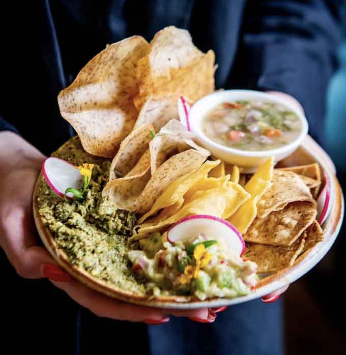 Toronto’s favourite vegan restaurant has graciously provided the recipe for its famous guacamole created by Chef Juan Alvarez.
Its combination of fresh avocado, tomatoes and jalapeno makes this guacamole a mouth watering favourite that they know your readers will enjoy, whether at Rosalinda’s aesthetic dining room or from the comfort of home.